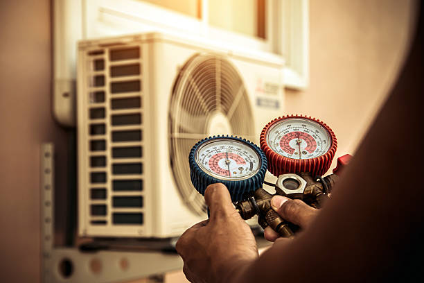 Professional Air Conditioning Service technician working in North Haven, CT